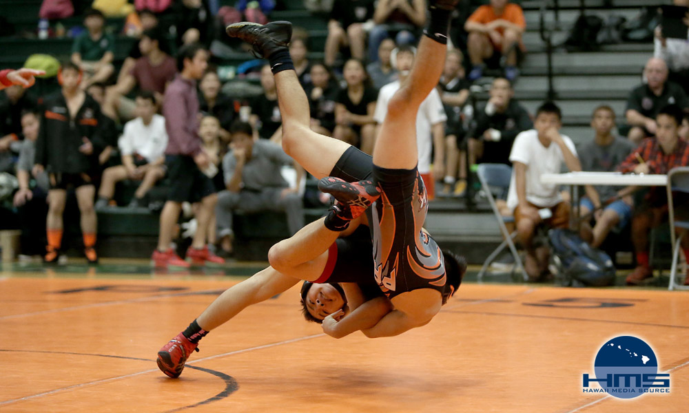 Wrestling action at Mid-Pacific